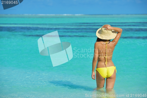 Image of beautiful  woman relax on tropical  beach