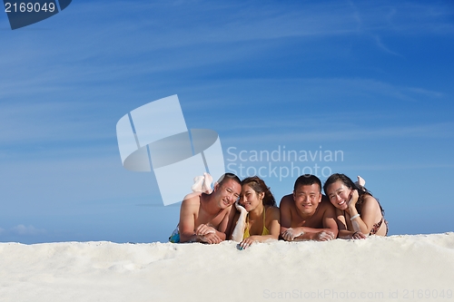 Image of group of happy young people have fun on bach