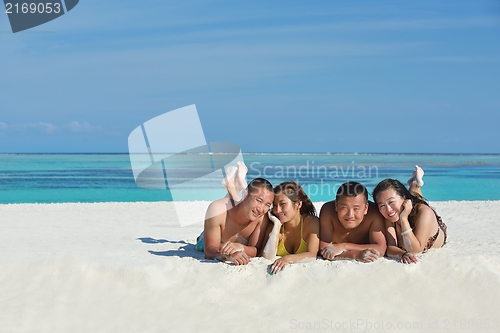 Image of group of happy young people have fun on bach