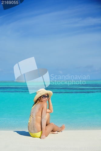 Image of beautiful  woman relax on tropical  beach