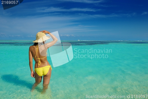 Image of beautiful  woman relax on tropical  beach