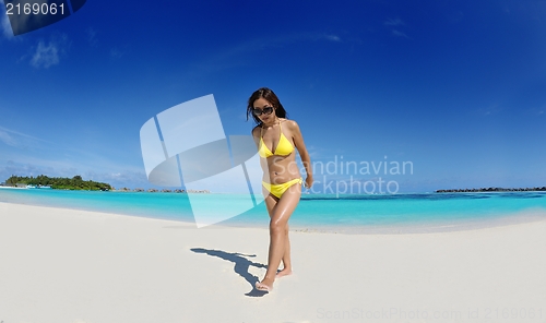 Image of beautiful  woman relax on tropical  beach