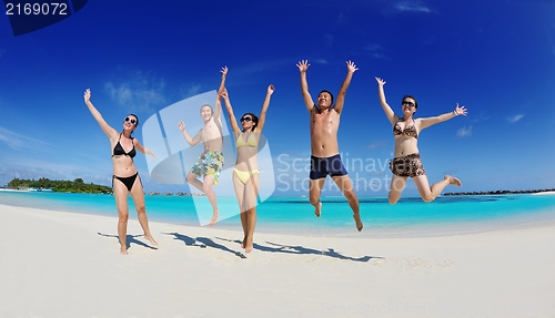 Image of group of happy young people have fun on bach