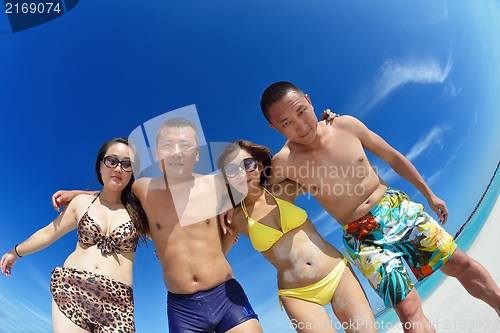 Image of group of happy young people have fun on bach