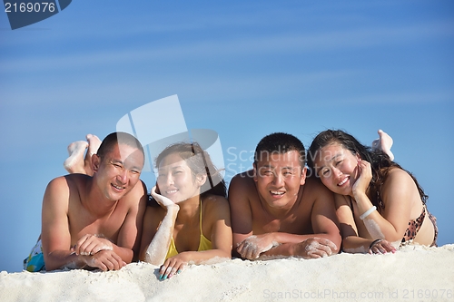 Image of group of happy young people have fun on bach