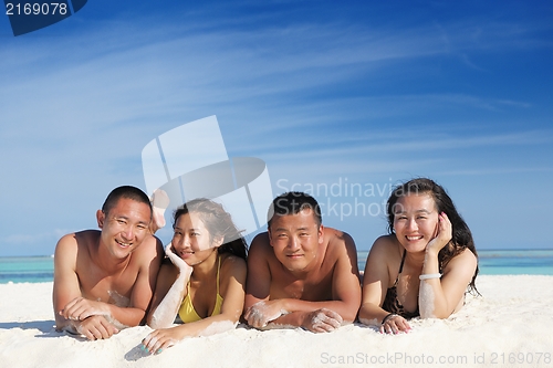 Image of group of happy young people have fun on bach