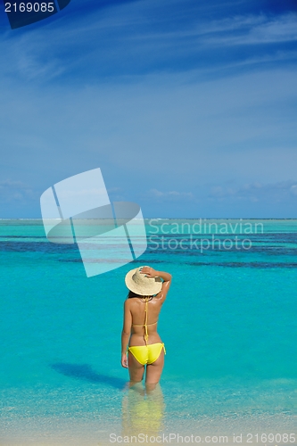 Image of beautiful  woman relax on tropical  beach