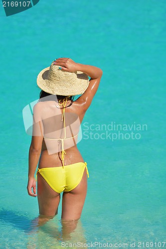 Image of beautiful  woman relax on tropical  beach