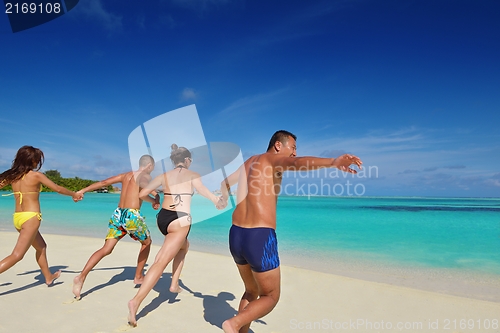 Image of group of happy young people have fun on bach
