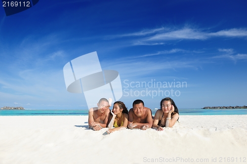 Image of group of happy young people have fun on bach