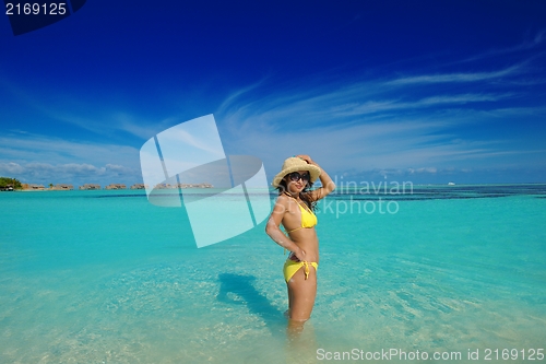 Image of beautiful  woman relax on tropical  beach