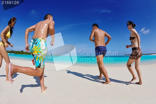 Image of group of happy young people have fun on bach