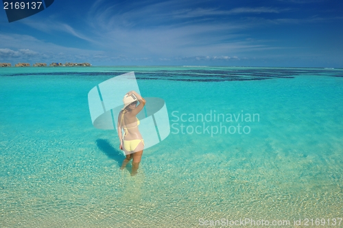 Image of beautiful  woman relax on tropical  beach