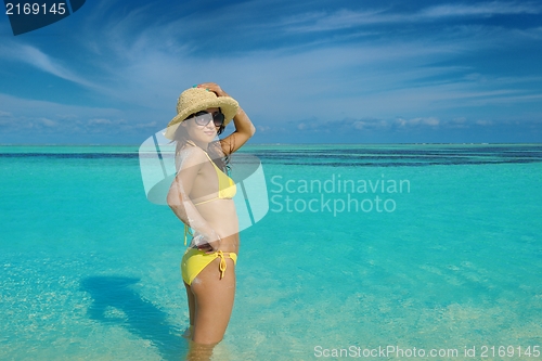 Image of beautiful  woman relax on tropical  beach