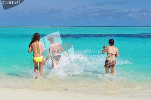 Image of group of happy young people have fun on bach
