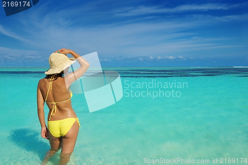 Image of beautiful  woman relax on tropical  beach