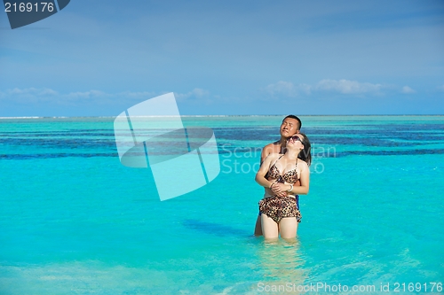 Image of beautiful  woman relax on tropical  beach