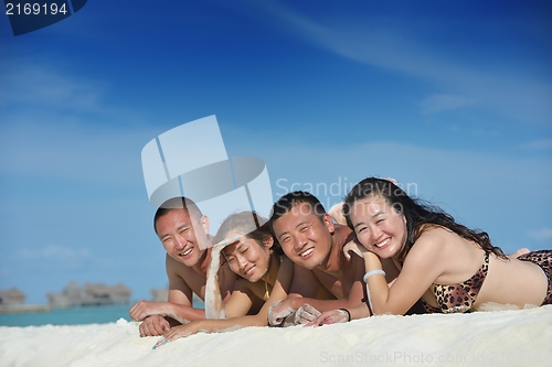 Image of group of happy young people have fun on bach