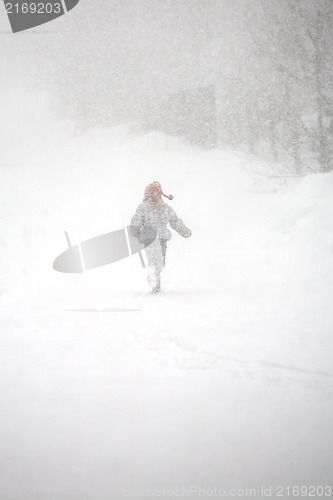 Image of little girl in snowstorm