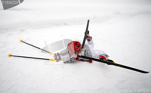 Image of fallen little skier