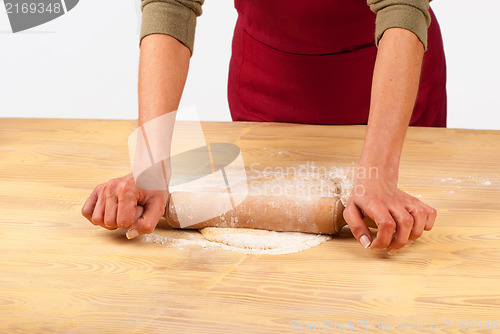 Image of Flattening dough