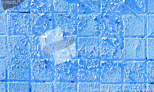Image of peeling paint on the wall