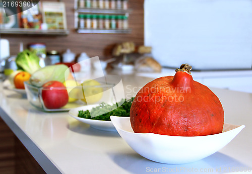 Image of Fruit and vegetables in the well designed modern kitchen 