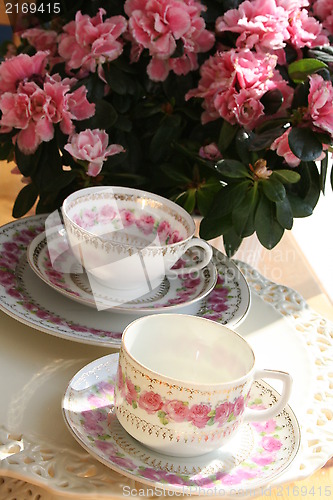 Image of Cups with roses and Azalea