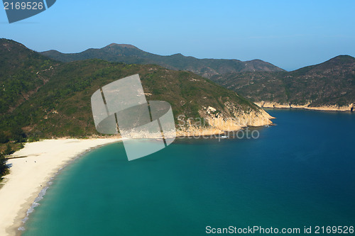 Image of beach with blue sky and sea