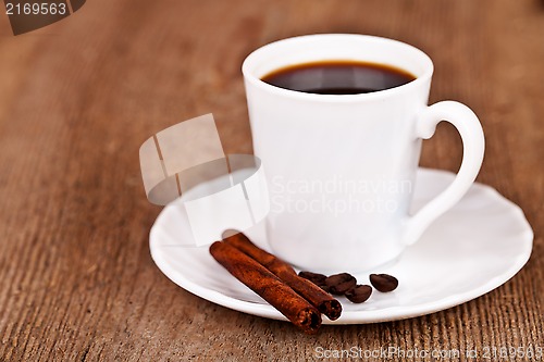 Image of cup of coffee and cinnamon