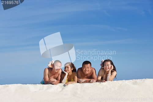 Image of group of happy young people have fun on bach