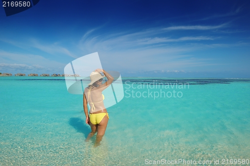 Image of beautiful  woman relax on tropical  beach