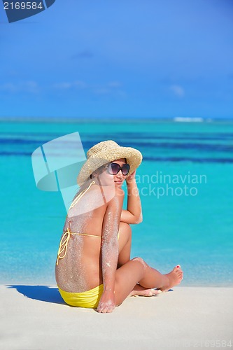 Image of beautiful  woman relax on tropical  beach