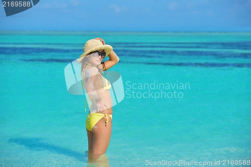 Image of beautiful  woman relax on tropical  beach