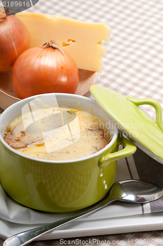Image of onion soup with melted cheese and bread on top