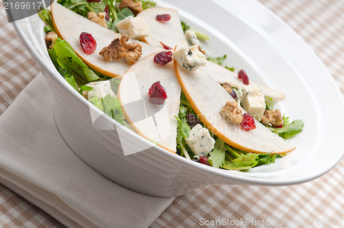 Image of Fresh pears arugula gorgonzola cheese salad