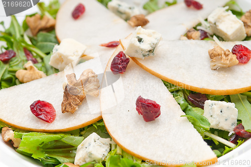Image of Fresh pears arugula gorgonzola cheese salad