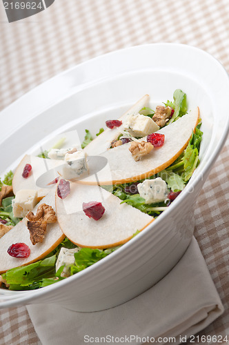 Image of Fresh pears arugula gorgonzola cheese salad