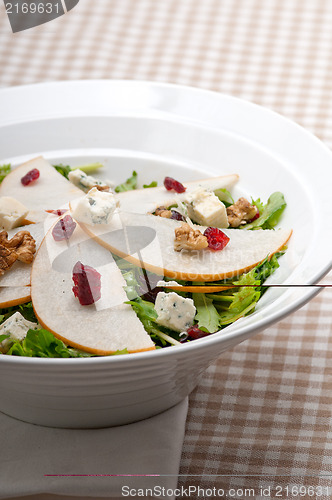 Image of Fresh pears arugula gorgonzola cheese salad