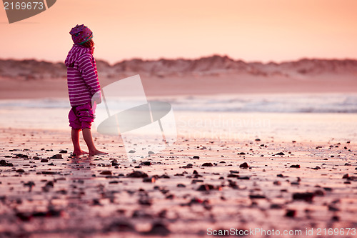 Image of Little girl in the beach