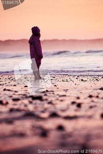 Image of Little girl in the beach