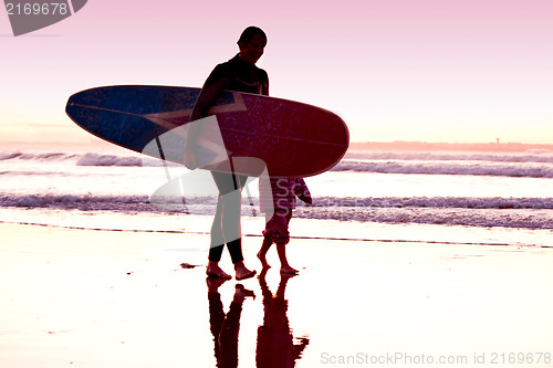 Image of Female surfer