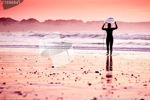 Image of Female surfer