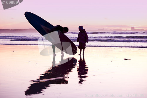 Image of Female surfer