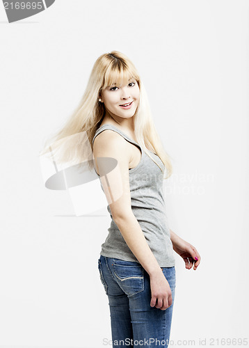 Image of Blonde woman looking back