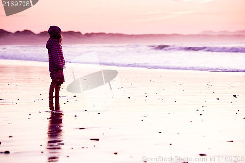 Image of Little girl in the beach