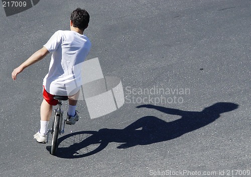 Image of Boy on a unicycle