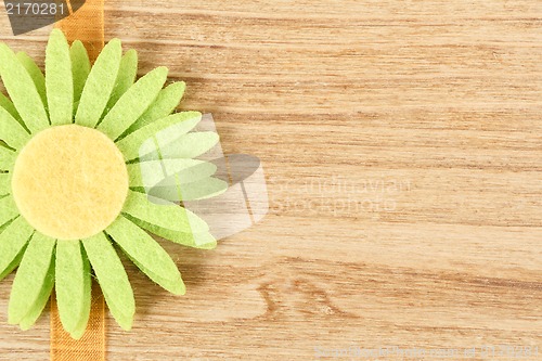 Image of wooden board for spring message with flowers