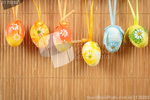 Image of Bright color easter eggs with bows