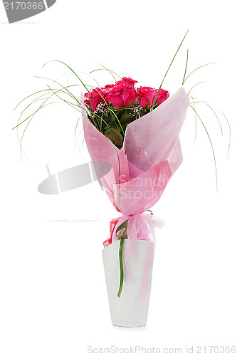 Image of Colorful flower bouquet from red roses in white vase isolated on